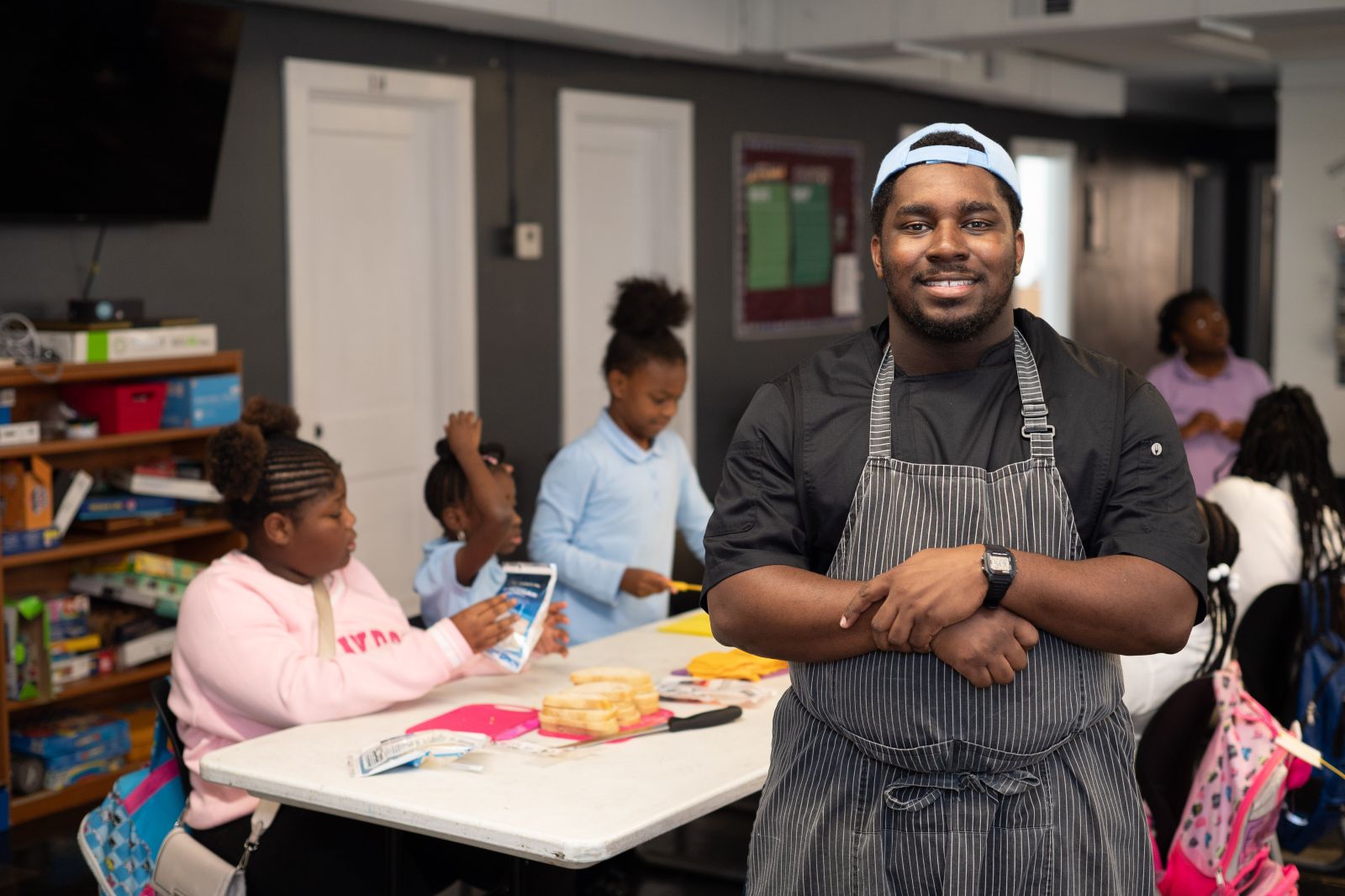 Chef Reggie Miller brings people to the table, using food, story, and shared exp